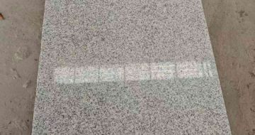 海东芝麻白光面毛板