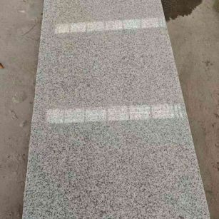 海东芝麻白光面毛板