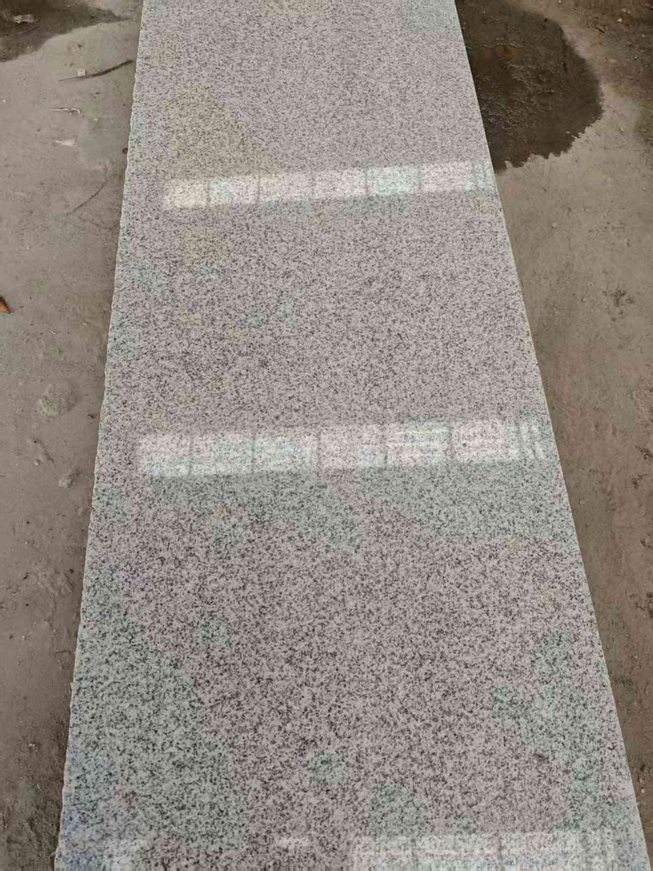 海东芝麻白光面毛板